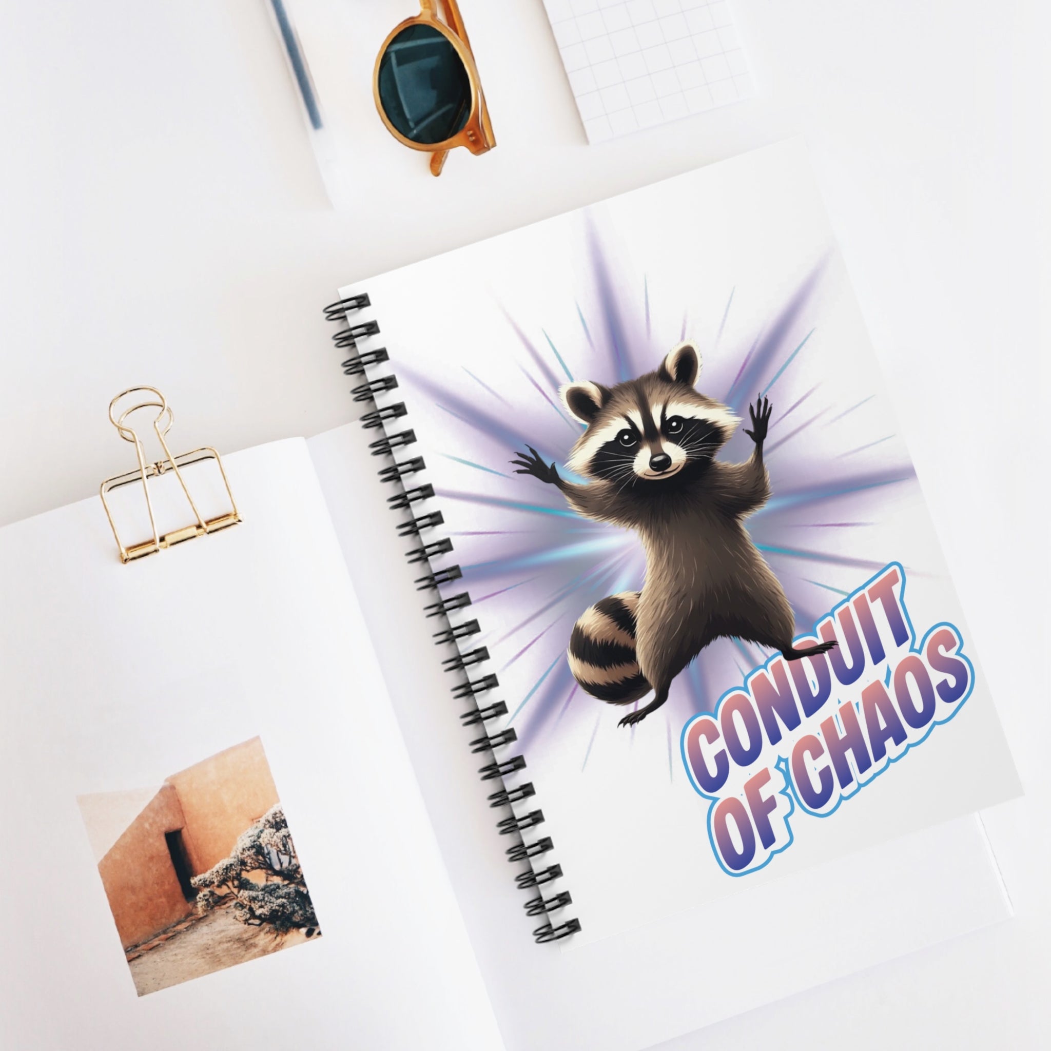 Conduit of Chaos Spiral Notebook — Cute Raccoon Graphic Ruled Journal